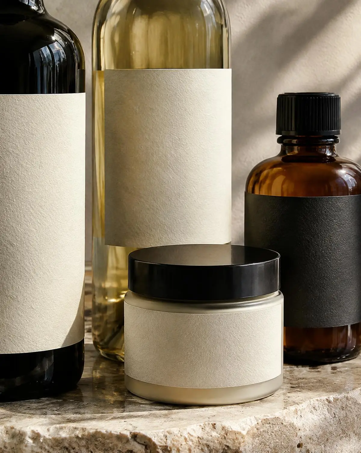 Bottles and jars with textured paper labels